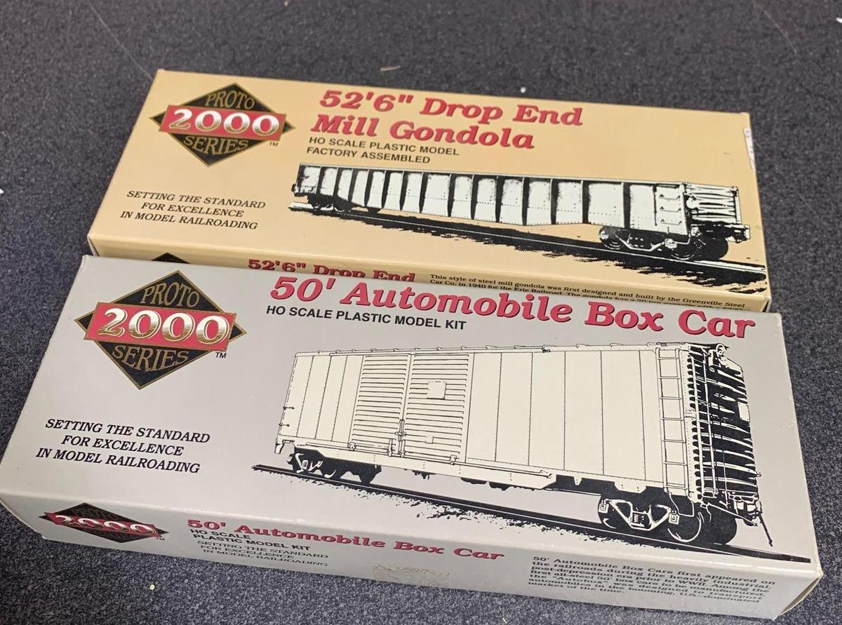Two Proto 2000 Series Ho Scale train cars