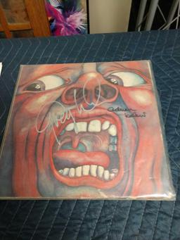 King Crimson album signed by Greg Lake and Robert Frippand Defjamback clear vinyl album limited