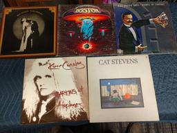 Five record albums including cat Stevens, Kim carnes, Boston, Blue oyster cult, and Boz scaggs