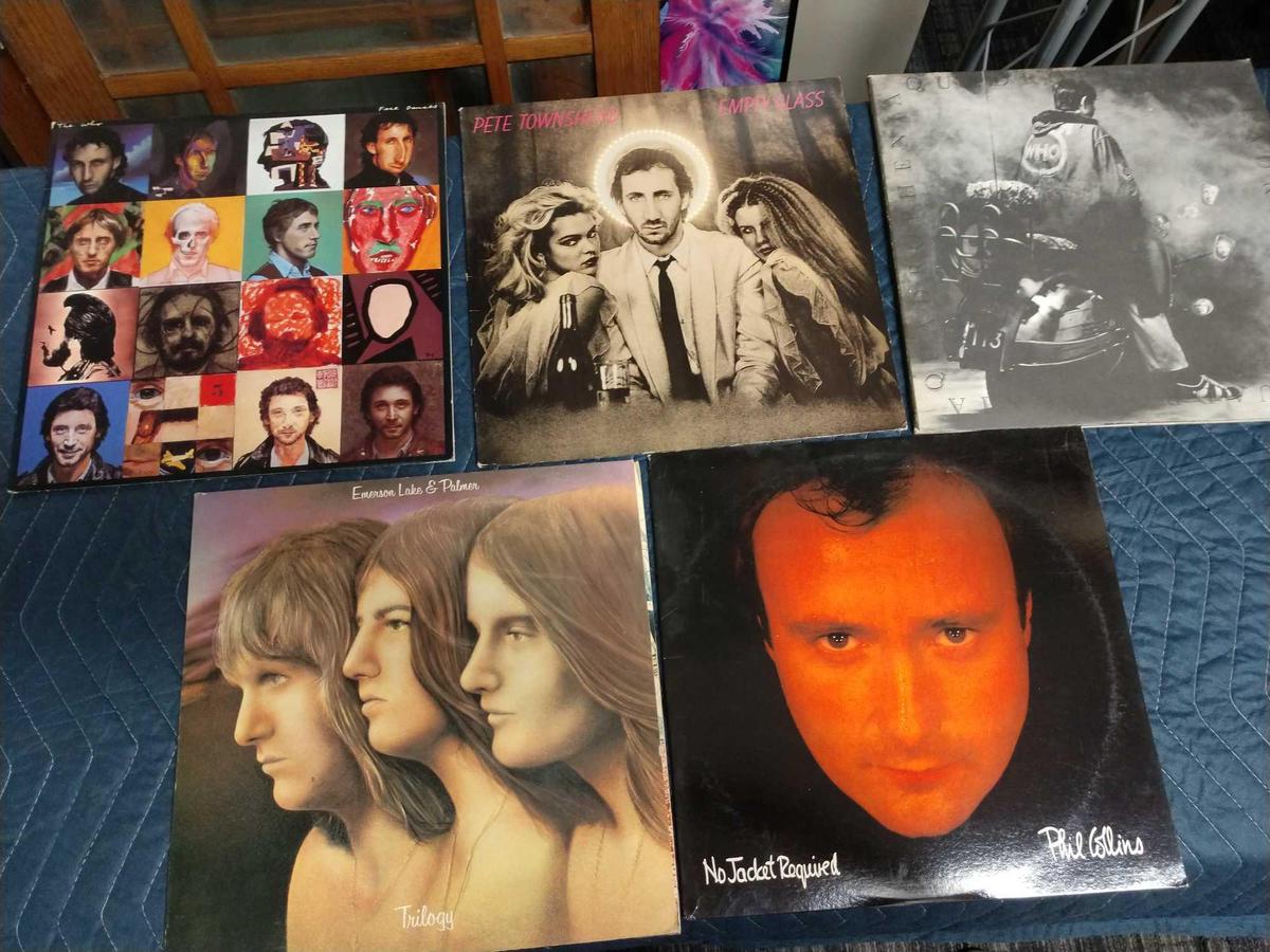 Five record albums including Phil Collins, Emerson Lake and Palmer, The who, and Pete Townsend