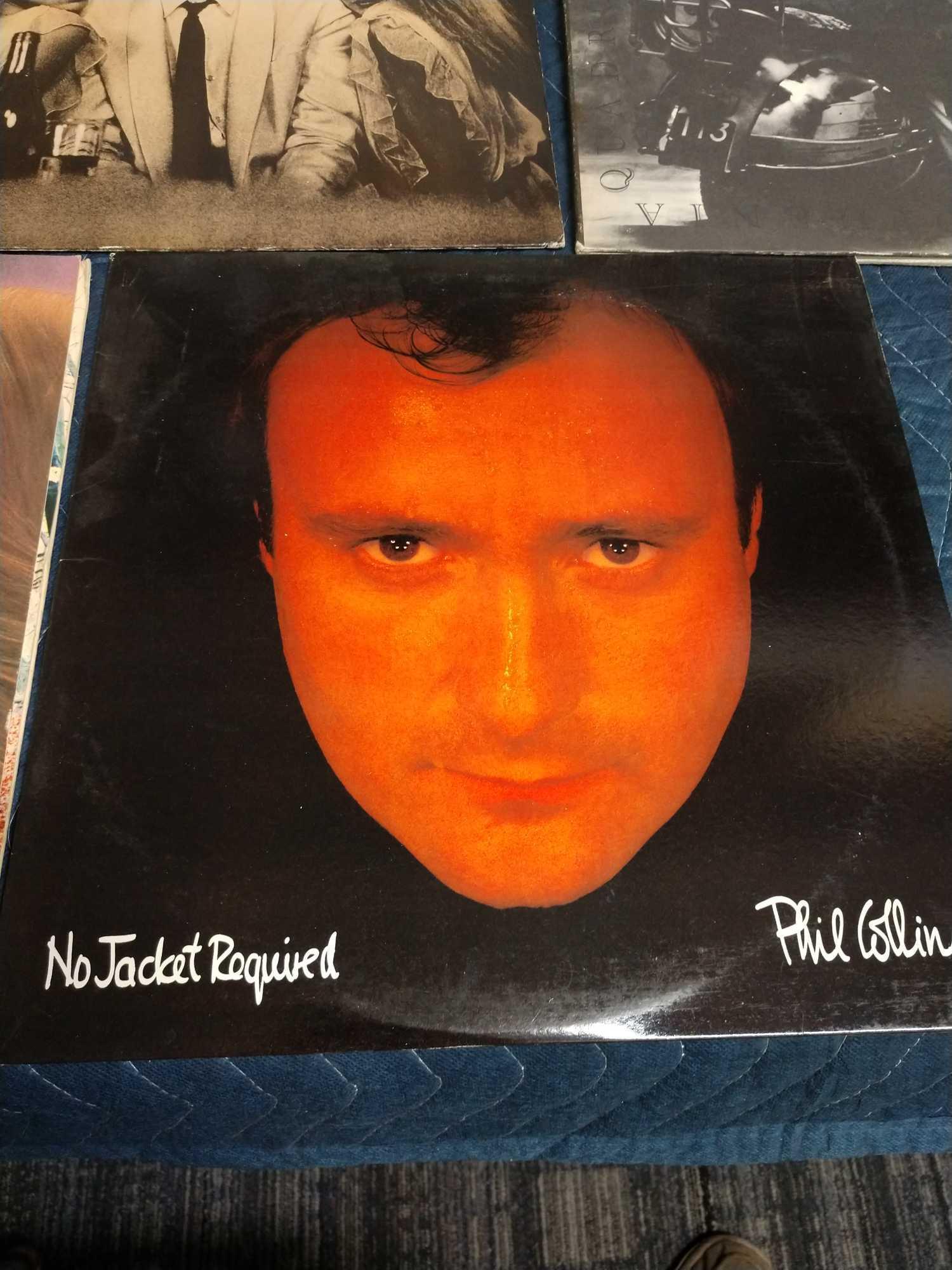 Five record albums including Phil Collins, Emerson Lake and Palmer, The who, and Pete Townsend