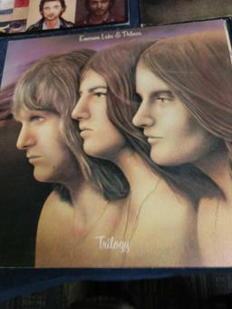 Five record albums including Phil Collins, Emerson Lake and Palmer, The who, and Pete Townsend