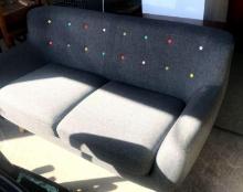 Gray couch 60s style