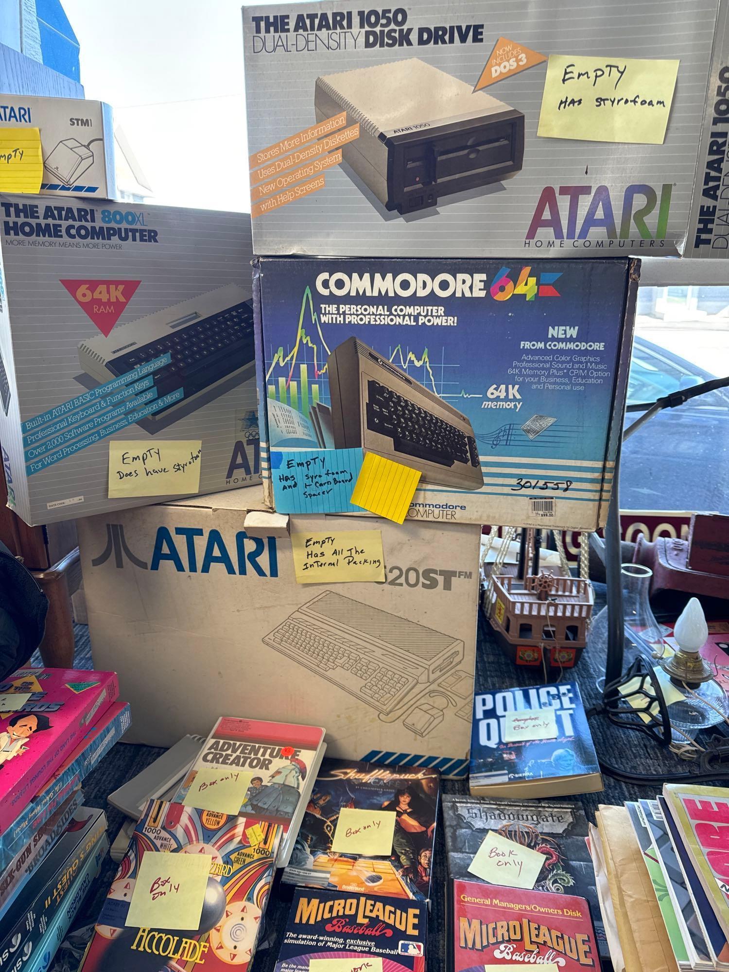 Collection of original Atari and commodore 64 empty boxes