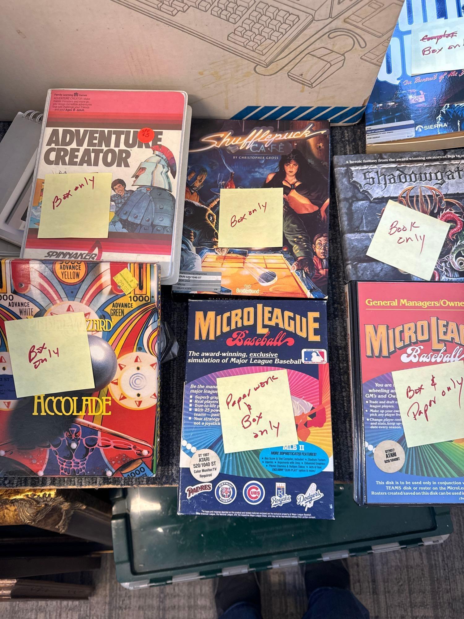 Collection of original Atari and commodore 64 empty boxes