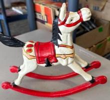 heavy cast-iron rocking horse doorstop