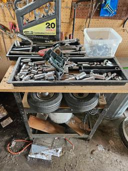 Work table with contents, tools, and more