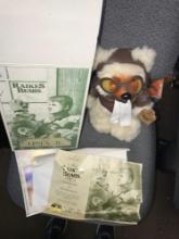 Raikes Bears Lindy Jr. with certificate of authenticity