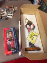NASCAR Jeff Gordon figurine and bobble head in basement