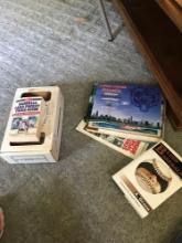 Assorted sports books/autographed box// living room