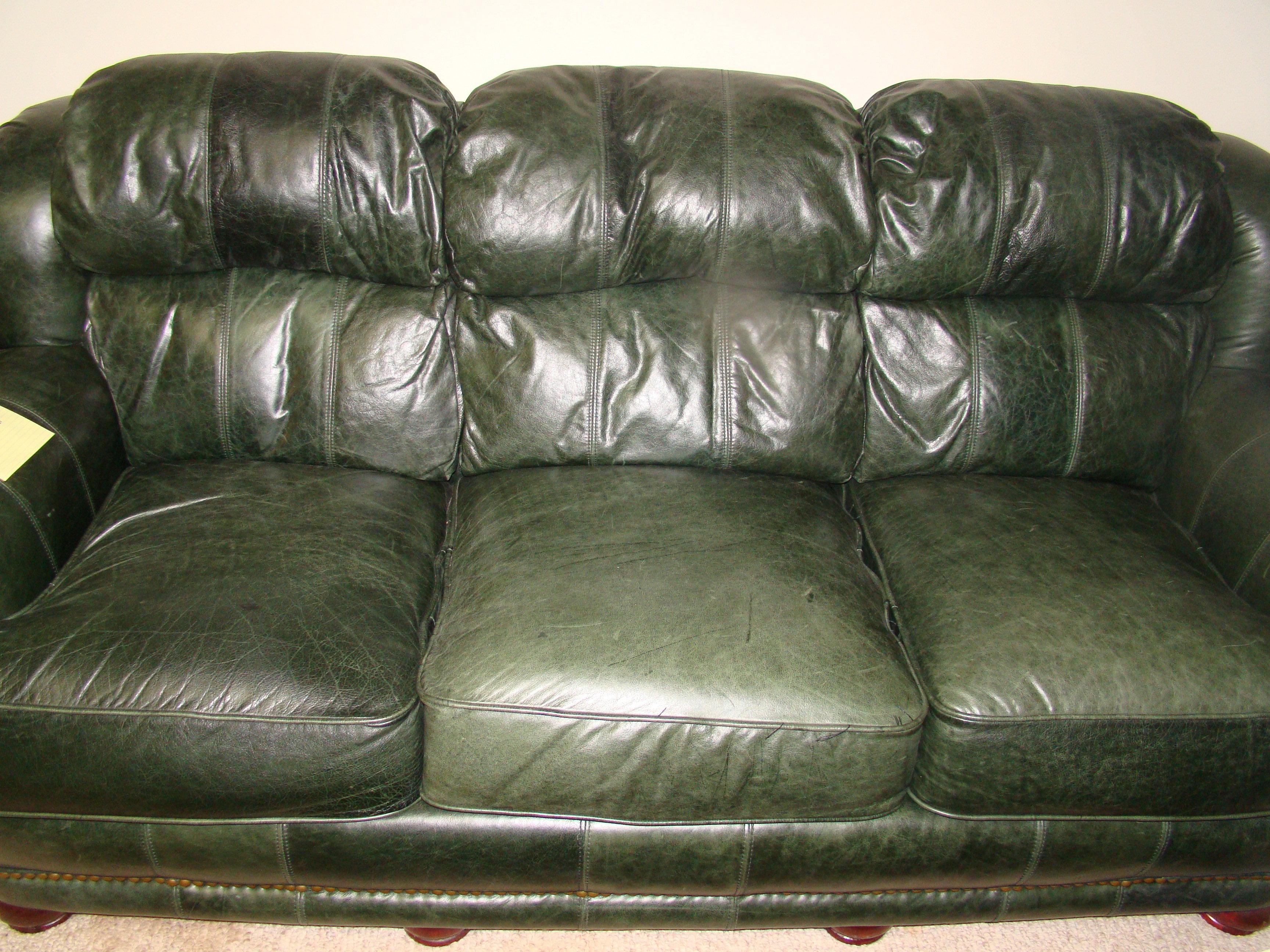 LEATHER SOFA BY LANE PURCHASED FROM MAYNARDS DARK GREEN
