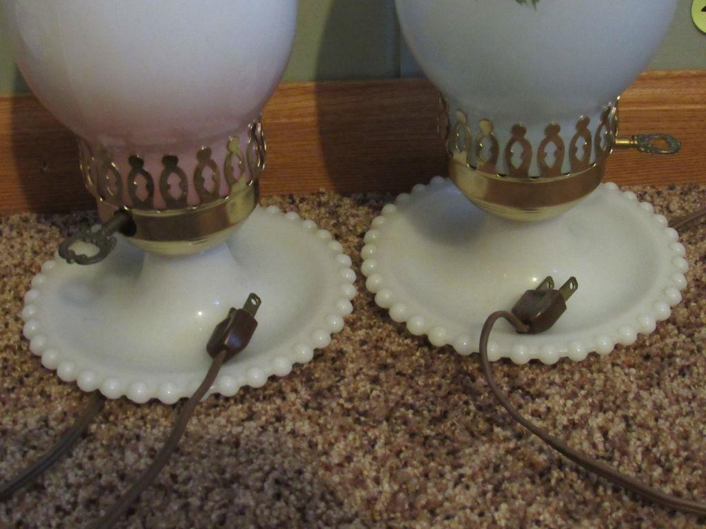 2 hurricane lamps