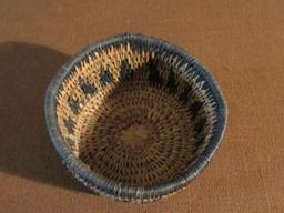 2 woven round baskets