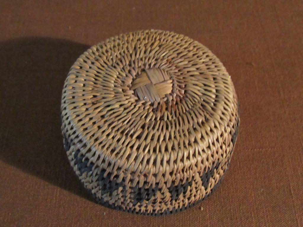 2 woven round baskets