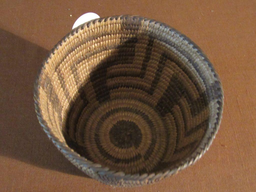 2 woven round baskets