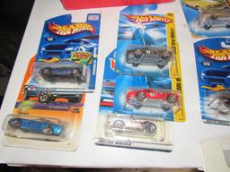 2 boxes of various hot wheels