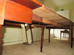 Antique expandable dining table