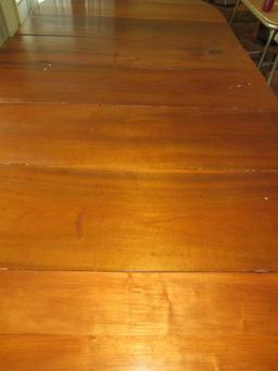 Antique expandable dining table