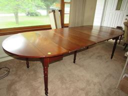 Antique expandable dining table