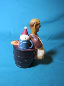 Monk on the barrel