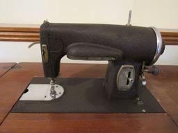 Kenmore sewing machine with cabinet