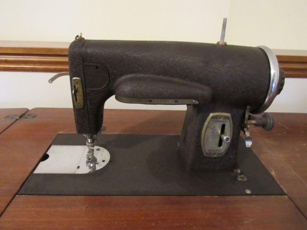 Kenmore sewing machine with cabinet