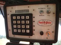 Feed-R-MEter milk dispenser