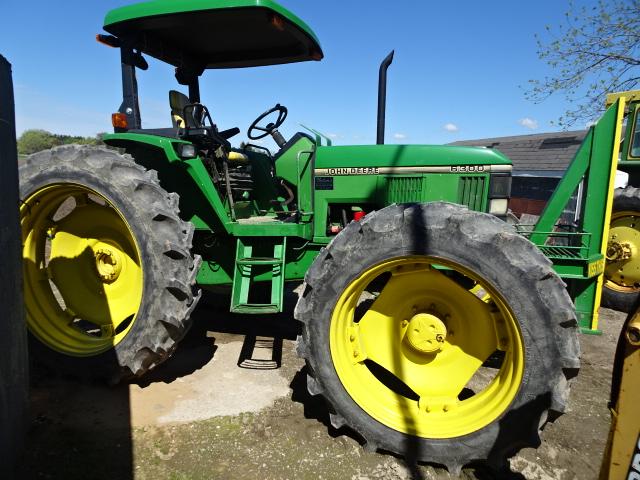 93 JD 6300 MFWD DSL. TRACTOR