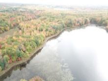 37.09 acres total w/ 22+/- acres of wooded recreational land & 15+/-acres pond.