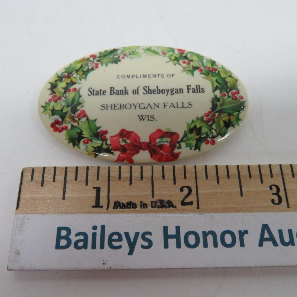 Three Sheboygan Falls bank advertising items, pocket mirror and key tags