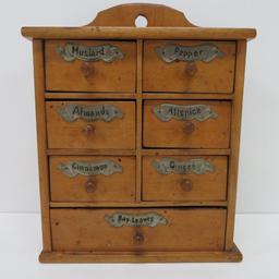 Seven drawer spice cabinet