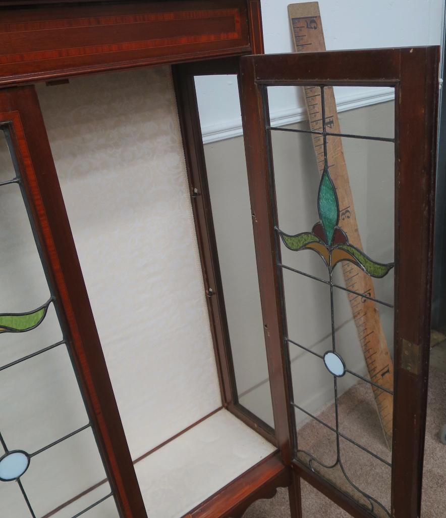 Ornate leaded glass two door cabinet