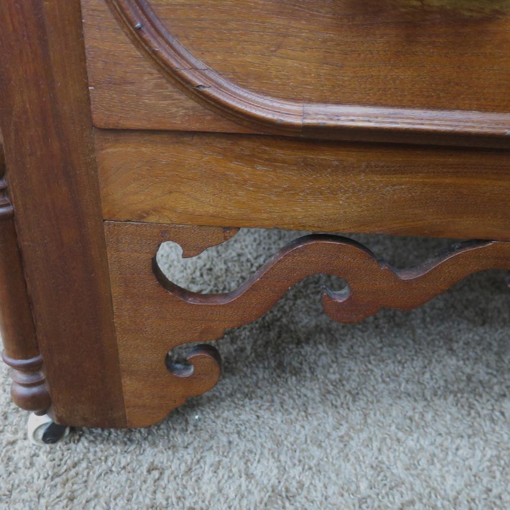 Ornate fruit carved walnut dresser with marble inset and mirror