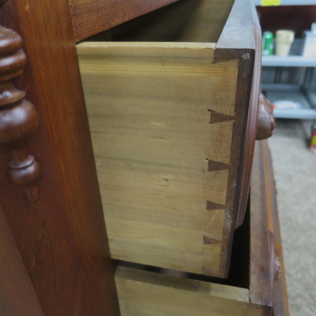 Ornate fruit carved walnut dresser with marble inset and mirror