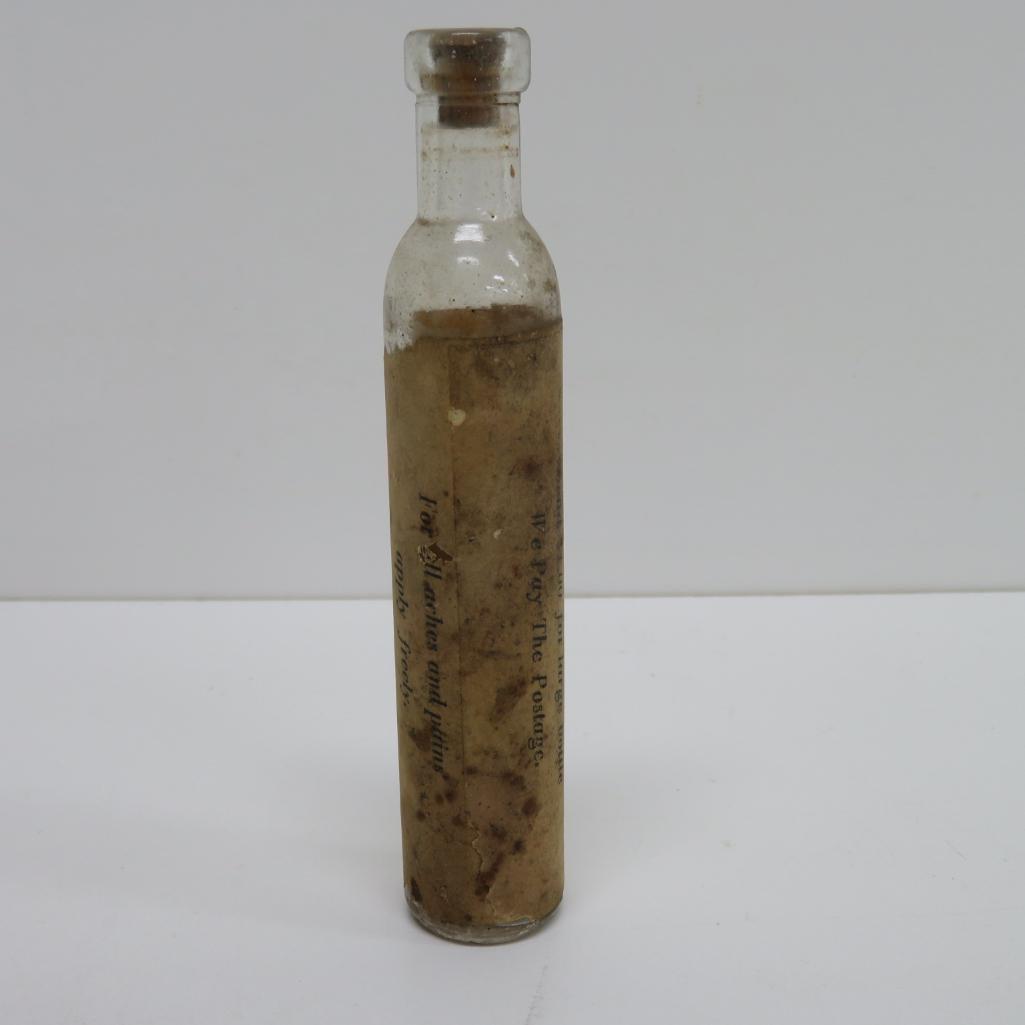 Antique Snakeoil bottle with original paper label