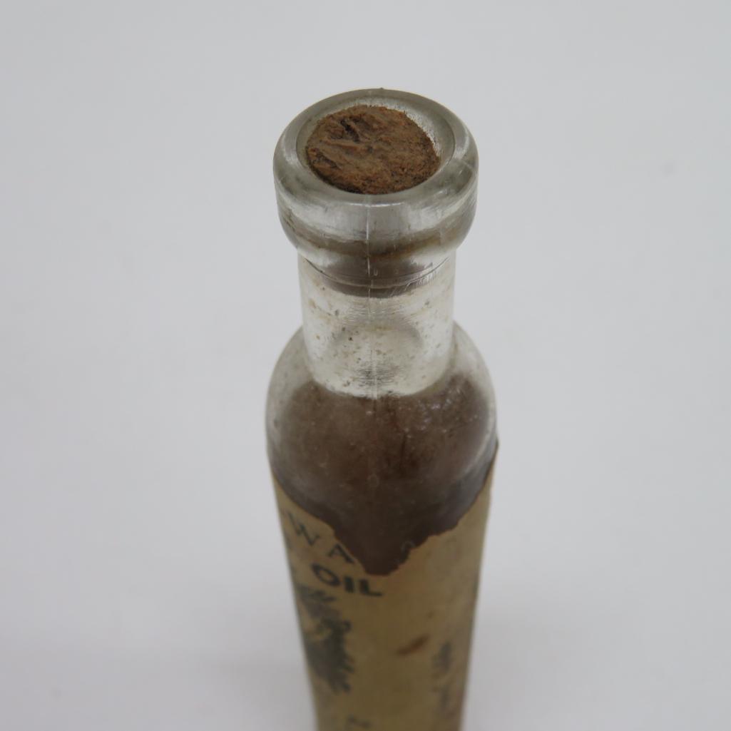 Antique Snakeoil bottle with original paper label