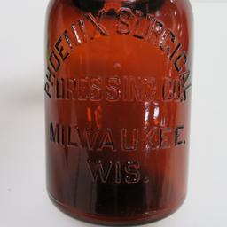 Phoenix Surgical Dressing Company, Milwaukee Wisconsin amber jar