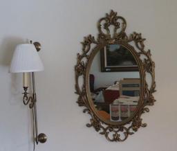 Mirror and sconce