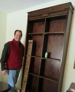 Unusual tall roll front cabinet