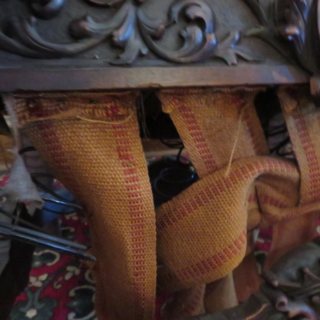 Highly carved ornate Gothic side chair with figural carvings