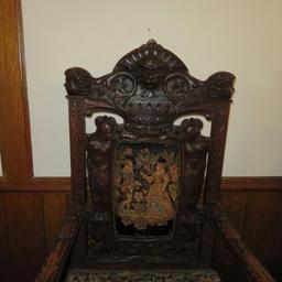 Highly carved ornate Gothic side chair with figural carvings
