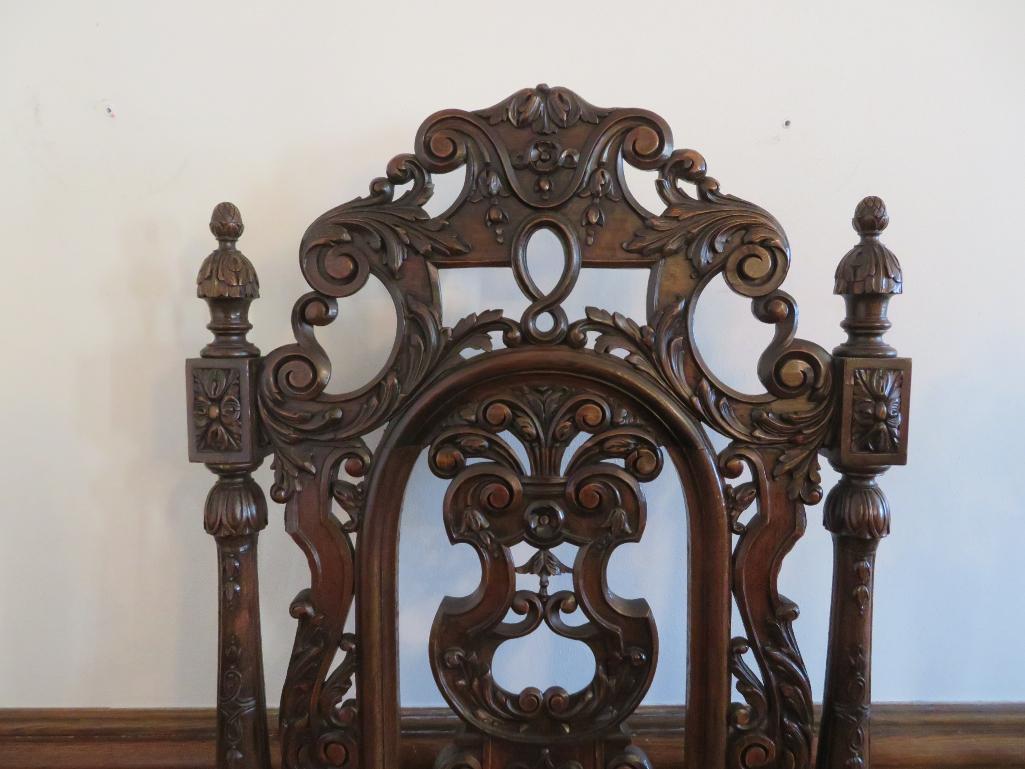 William and Mary style heavily carved side chair with a botanical upholstery seat