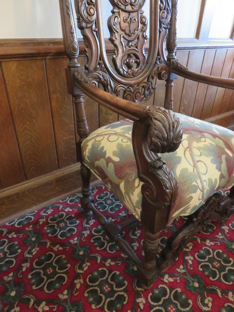 William and Mary style heavily carved side chair with a botanical upholstery seat