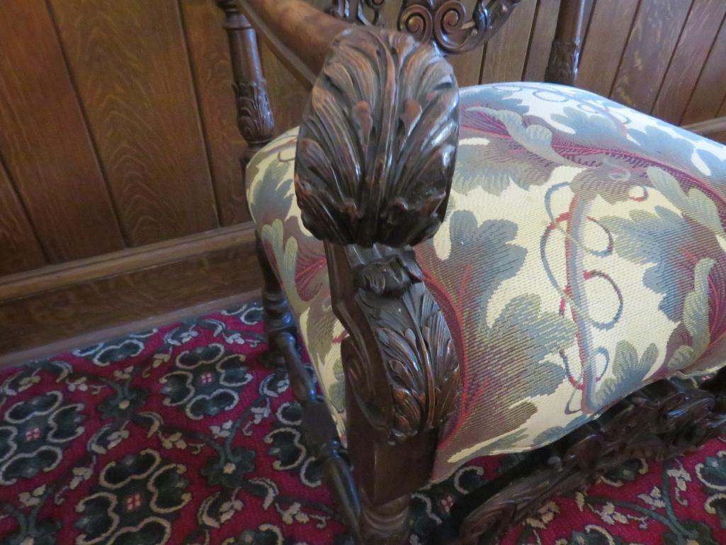 William and Mary style heavily carved side chair with a botanical upholstery seat