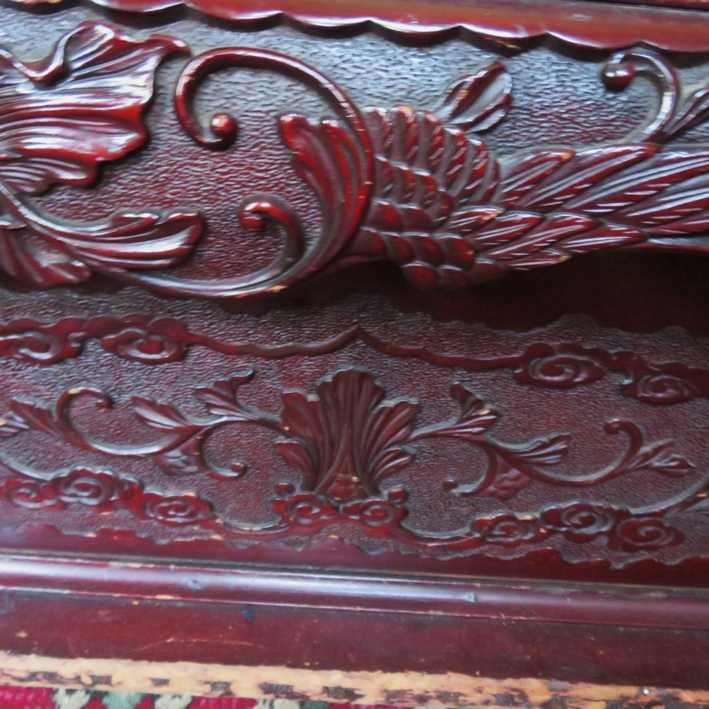 Heavily carved oriental entry bench