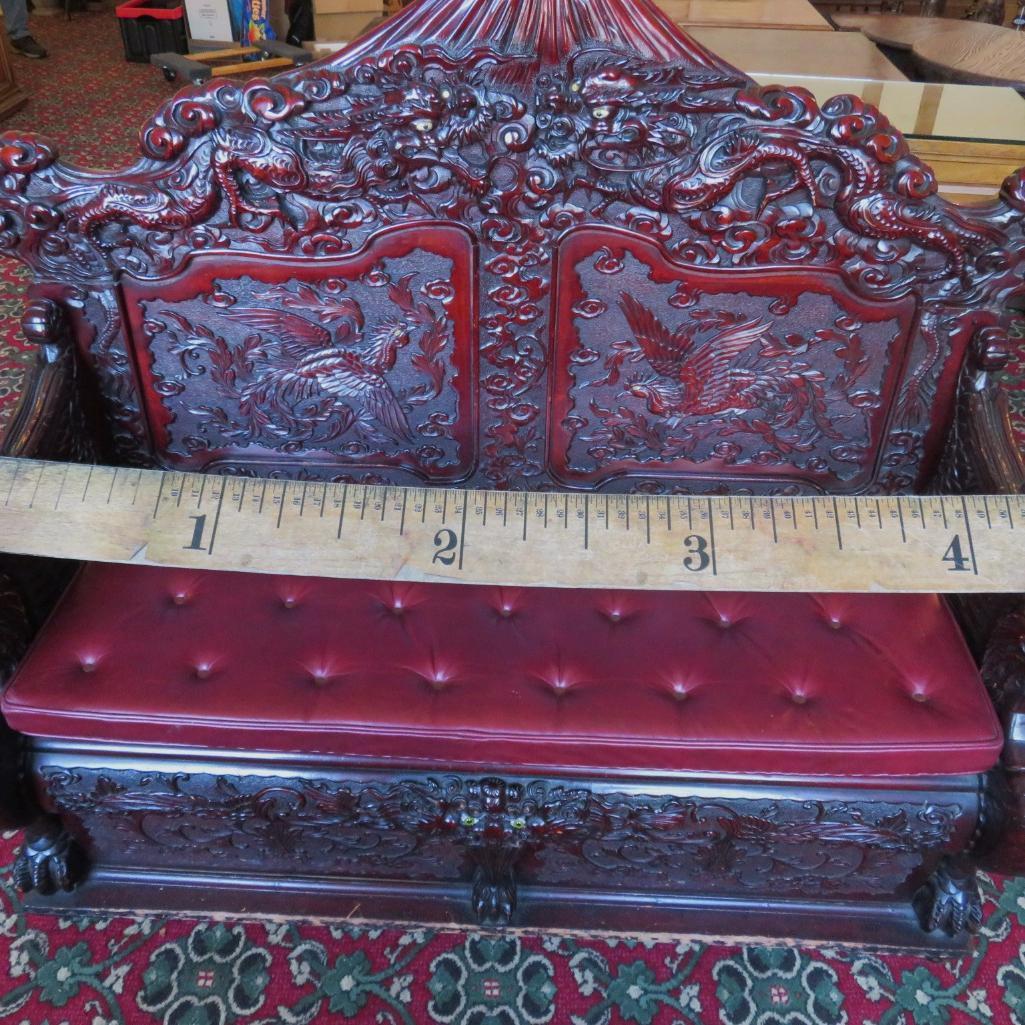 Heavily carved oriental entry bench