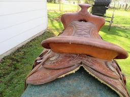 Nice leather tooled saddle, saddle stand, 14" seat