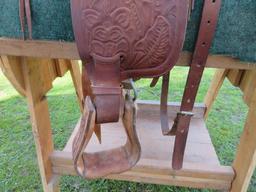 Nice leather tooled saddle, saddle stand, 14" seat