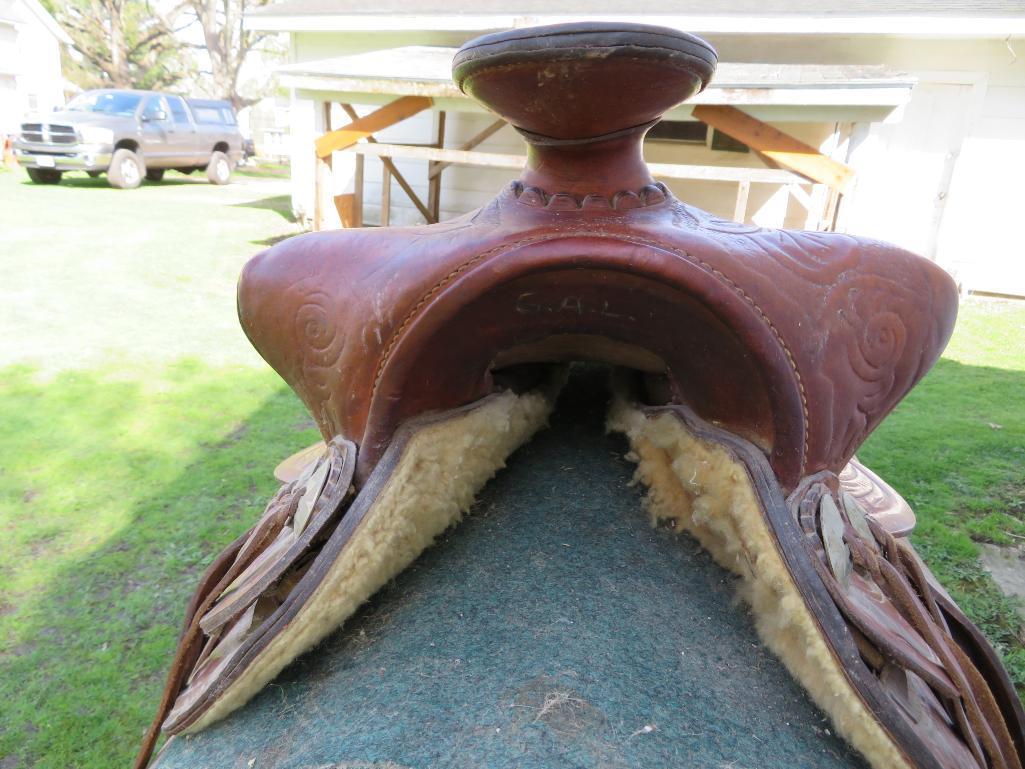 Nice leather tooled saddle, saddle stand, 14" seat