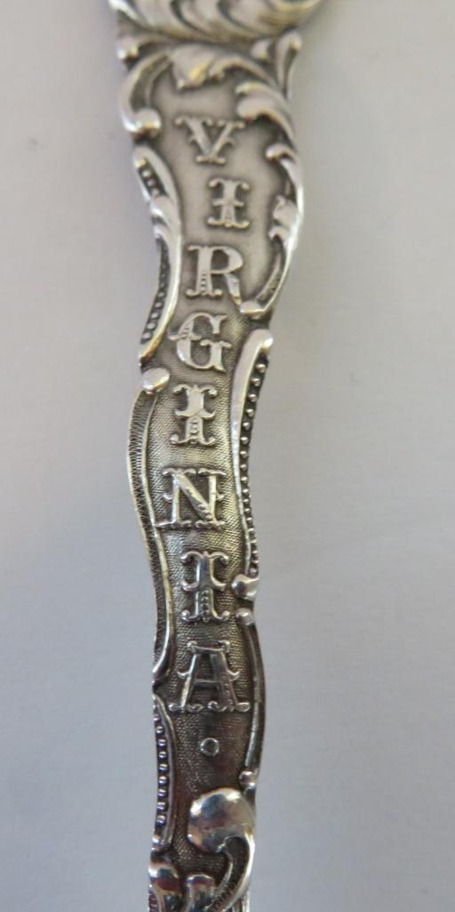 For Sterling souvenir spoons, for from Wisconsin and one from Virginia